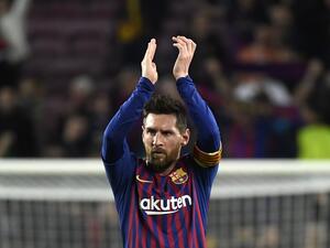Barcelona's forward Lionel Messi celebrates at the end of the Champions League semi-final first leg match against Liverpool at the Camp Nou Stadium on May 1, 2019. LLUIS GENE / AFP