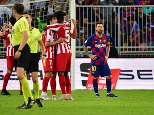 Messi and Antoine Griezmann led Barcelona to a 2-1 lead in the second half before Atletico scored twice in the final 10 minutes