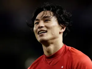  The Japan international, who has agreed a January switch to Anfield, claims to be relishing the opportunity to work with "many world-class players" 
