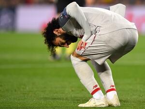 Salah went down after colliding with Newcastle goalkeeper Dubravka in the second half