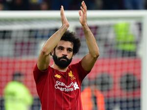  The Red Devils legend has drawn comparisons between his old team-mate and the man currently leading the line at Anfield (Photo: AFP)