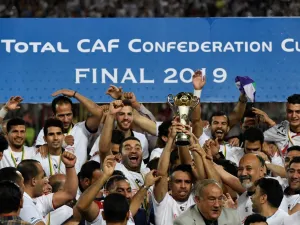 Egypt's Zamalek players celebrate with the trophy after they won the CAF Confederation Cup final football match between Egypt's Zamalek and Morocco's RSB Berkane