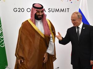 Vladimir Putin and Mohammed bin Salman on the sidelines of the G20 Summit in Osaka on June 29. (Yuri Kadobnov/AFP via Getty Images)