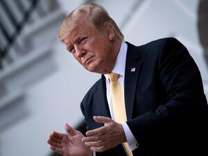 US President Donald Trump claps during an event for 2018 NASCAR Cup Series Champion Joey Logano on the South Lawn of the White House on April 30, 2019, in Washington, DC. (Brendan Smialowski / AFP)