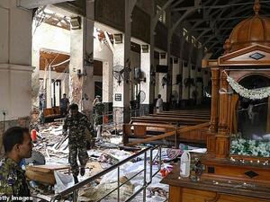 Sri Lankan security personnel inspect the damage at St Anthony's Shrine. (AFP/ File)