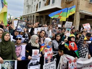 Moroccans shout slogans while waving the Berber, or Amazigh, flag during a demonstration against the court of appeal rulings on Al-Hirak al-Shaabi or "Popular Movement" activists, in the capital Rabat on April 21, 2019. (AFP/ File)