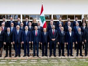 Lebanese Cabinet pose for a group photo with President Michel Aoun, first row center, Prime Minister Saad Hariri, first row center right. (AFP)