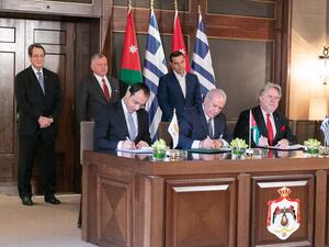 King Abdullah II, President of Cyprus Nicos Anastasiades and Prime Minister of #Greece Alexis Tsipras witness the signing of agreements and memorandums of understanding between the three countries. (Twitter/ @RHCJO)