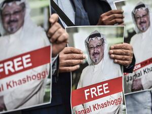 Protestors hold pictures of missing journalist Jamal Khashoggi during a demonstration in front of the Saudi Arabian consulate on October 8, 2018 in Istanbul. (Ozan Kose/AFP via Getty Images)