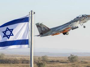 An Israeli Air Force F-15 Eagle fighter plane performs at an air show during the graduation of new cadet pilots at Hatzerim base in the Negev desert, on June 29, 2017. (Jack Guez/ AFP)