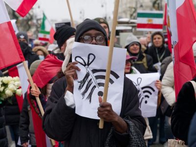 Protestor holds a sign