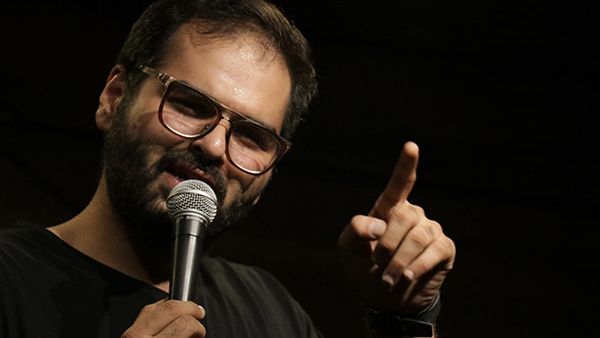 Kunal Kamra taking the stage at the Raj Mahal Theatre in Bollywood Parks Dubai