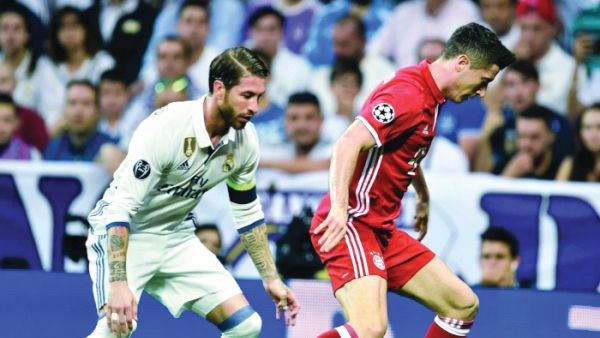 صورة أرشيفية لليفاندوفسكي وراموس