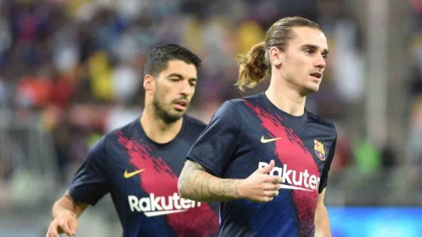 غريزمان (يمين) أمام فرصة لإثبات وجوده بعد إصابة سواريز