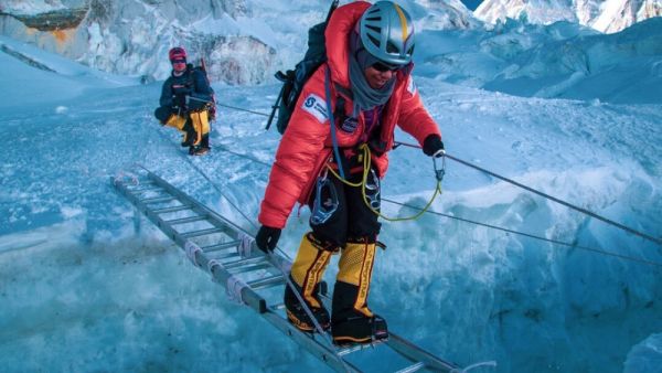 Documentary filmmaker Elia Shaikaly said: "Nadhirah Al Harthy from Oman crossing a ladder on Mt. Everest. This was a newly formed crevice that wasn’t there a few days prior.” (Photo by @EliaSaikaly)