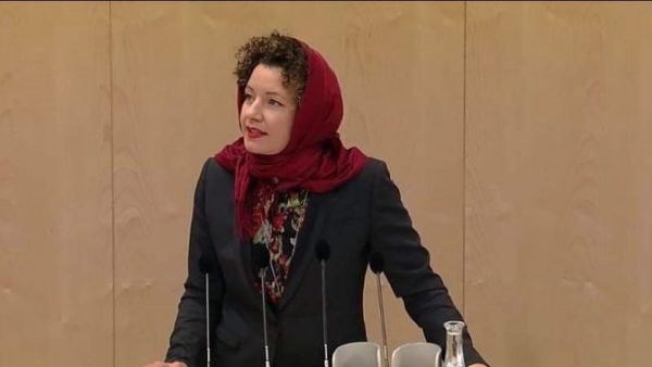 Martha Bissmann covered her hair during a general assembly speech on Friday to protest Hjab ban. (Screenshot)