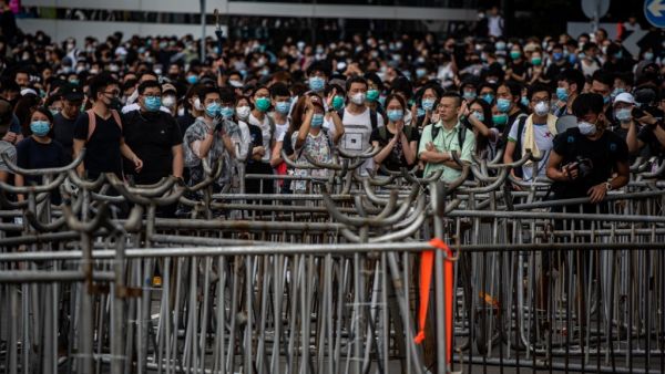 Protesters occupy outside Legislative Council in Hong Kong on June 12, 2019. Large crowds of protesters gathered in central Hong Kong as the city braced for another mass rally in a show of strength against the government over a divisive plan to allow extraditions to China. (Philip FONG / AFP)