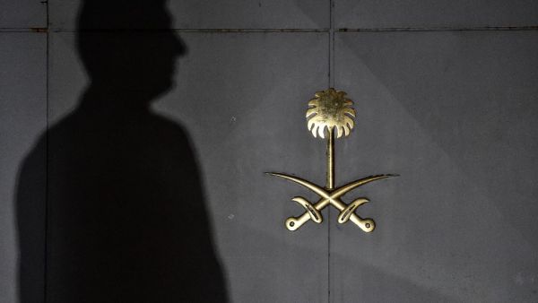 A security member waits in front of the gate door of the Saudi Arabian consulate on October 17, 2018 in Istanbul, few days after Saudi columnist Jamal Khashoggi's murder. (AFP)