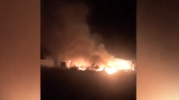 The refugee camp was set ablaze on Wednesday. (YouTube Screenshot)