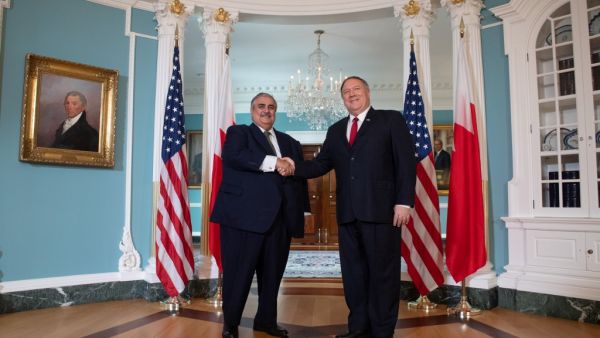 US Secretary of State Mike Pompeo (R) shakes hands with Bahraini Foreign Minister Khalid bin Ahmed Al Khalifa (L) prior to meetings at the State Department in Washington, DC, July 17, 2019.  SAUL LOEB / AFP