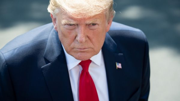 US President Donald Trump speaks to the media after arriving on the South Lawn of the White House in Washington, DC, July 30, 2019, following a trip to the 400th anniversary of Jamestown., Virginia. (SAUL LOEB / AFP)