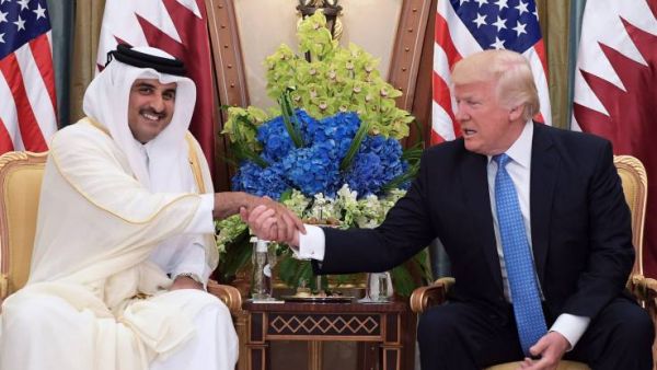 U.S. President Donald Trump (R) and Qatar's Emir Sheikh Tamim Bin Hamad Al-Thani take part in a bilateral meeting at a hotel in Riyadh on May 21. (AFP/ File Photo)