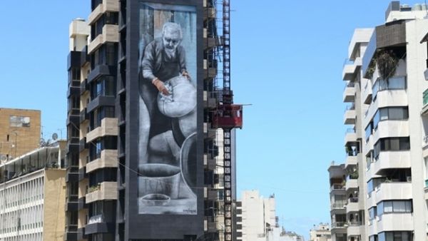 This salute to former Ras Beirut moubayed Abdul Razak Shehab was painted by Greek-born urban artist Simple G. (The Daily Star)