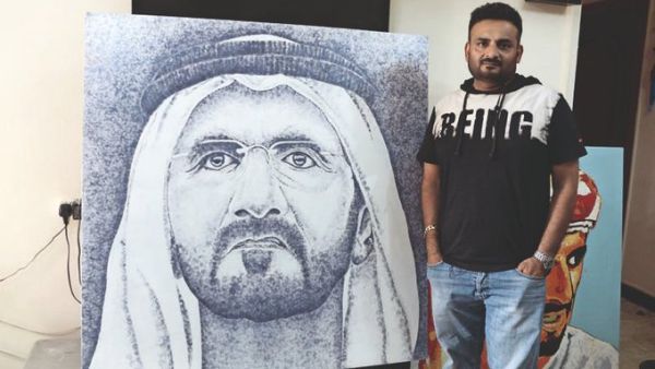 Indian artist makes Sheikh Mohamed's portrait with Expo logos. (Twitter)
