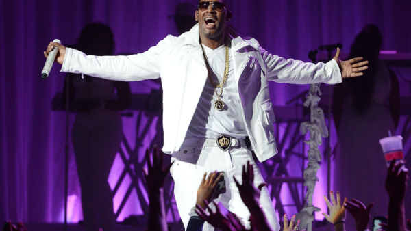 R. Kelly was arrested in Chicago tonight on charges contained in a 13-count indictment returned today in the Northern District of Illinois. (AFP/ File Photo)