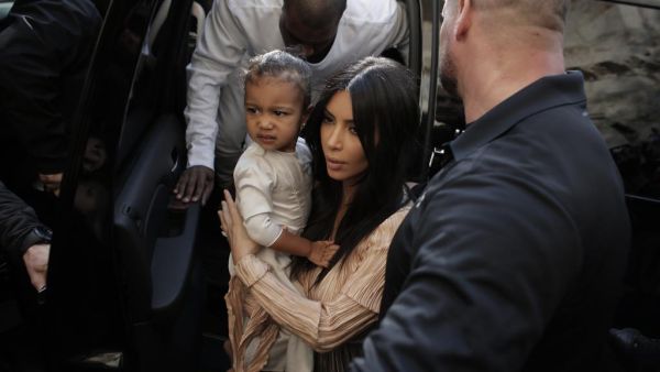 Kim Kardashian with North West. (Ahmad Gharabli / AFP)