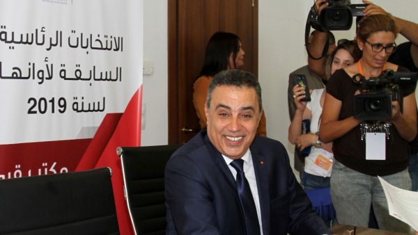 Former Tunisian prime minister Mehdi Jomaa speaks to reporters as he submits his candidacy for the upcoming early presidential elections at the Independent High Authority for Elections (ISIE) in the capital Tunis on August 4, 2019. (AFP/ File Photo)