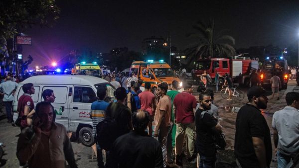 Onlookers gather during the night of August 5, 2019, at the scene of an accident that took place just before midnight (AFP)