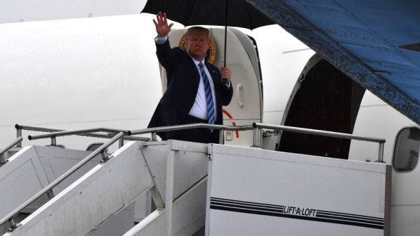 US President Donald Trump boards Air Force One at Pittsburgh International Airport in Pennsylvania on August 13, 2019, before returning to his Bedminster golf club in New Jersey where he is spending his summer vacation. (Nicholas Kamm / AFP)