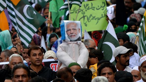 Demonstrators carry an effigy of Indian Prime Minister Narendra Modi during an anti-India protest rally in Karachi on August 25, 2019, in solidarity with India-administered Kashmiri. (AFP/ File Photo)