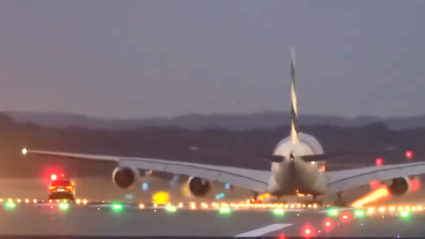 “Catch me if you can.” Featuring the Emirates Airbus A380 and the ‘Follow Me’ car. (Screenshot/ Twitter)