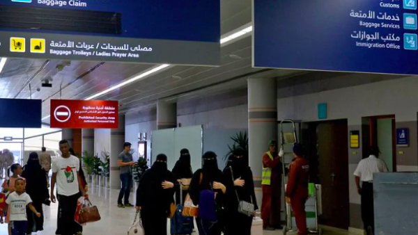 Saudi women at Abha airport in Saudi Arabia on June 13. Changes announced Friday will allow women to travel without permission from a male relative. (Fayez Nureldine/AFP/Getty Images)