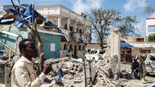 A suicide bomber rammed a vehicle loaded with explosives into the Medina hotel in the port town of Kismayo before several heavily armed gunmen forced their way inside, shooting as they went, authorities said. AFP