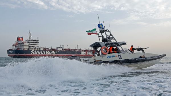 Iranian Revolutionary Guards patrol around the British-flagged tanker Stena Impero as it's anchored off the Iranian port city of Bandar Abbas (AFP)