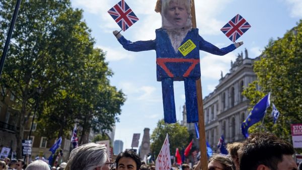 Demonstrators carry an effigy of Britain's Prime Minister Boris Johnson at a protest against the move to suspend parliament in the final weeks before Brexit outside Downing Street in London on August 31, 2019. (AFP/ File Photo)