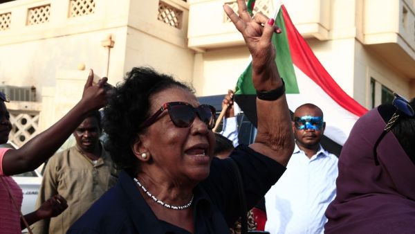 Sudanese woman takes part in a rally against the oppression of women, in Oumdurman the capital Khartoum’s twin city (AFP)