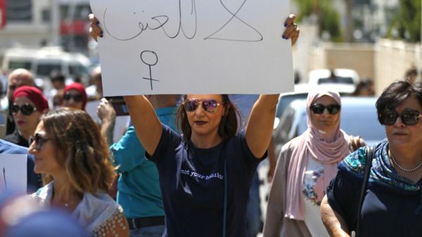 Palestinian women protest in support of women’s rights outside the prime minister’s office in the West Bank city of Ramallah (AFP)