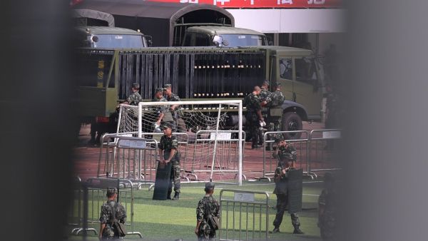 Chinese military personnel train at Shenzhen Bay stadium in Shenzhen in China's southern Guangdong province (AFP)