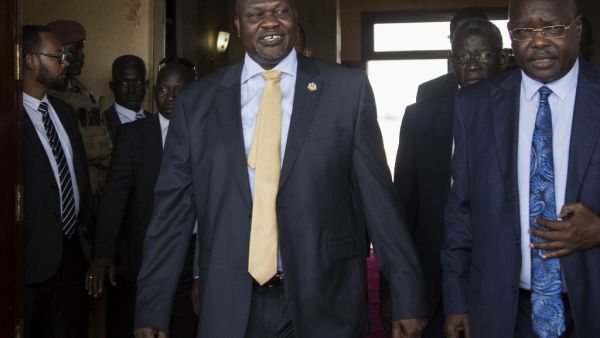 South Sudan's exiled rebel leader Riek Machar (L) arrives for a meeting with his rival, President Salva Kiir (not pictured) in Juba, South Sudan (AFP)