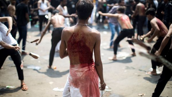 Shiite Muslim mourners flagellate themselves during a procession on the tenth day of Muharram which marks the day of Ashura, in New Delhi on September 10, 2019. (AFP/ File Photo)