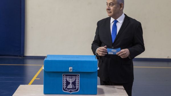 Israeli Prime Minister Benjamin Netanyahu casts his vote at a voting station in Jerusalem on September 17, 2019. Heidi Levine / POOL / AFP