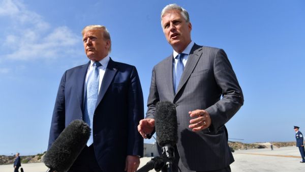 US President Donald Trump(L)speaks next to new national security advisor Robert O'Brien on September 18, 2019 at Los Angeles International Airport in Los Angeles, California. (AFP/ File Photo)