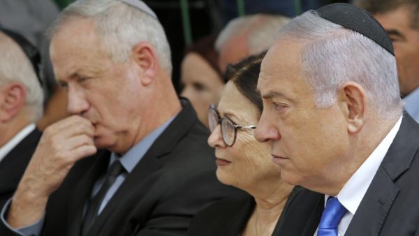 Israeli Prime Minister Benjamin Netanyahu (R), Israeli president of the Supreme Court Esther Hayut (C) and Benny Gantz (L), leader of Blue and White party, attend a memorial ceremony for late Israeli president Shimon Peres, at Mount Herzl in Jerusalem on September 19, 2019. (AFP/ File Photo)
