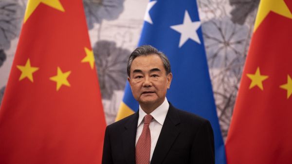 China's Foreign Minister Wang Yi looks on during the signing of a joint communique establishing diplomatic relations between China and the Solomon Islands, at the Diaoyutai State Guesthouse in Beijing on September 21, 2019. (NOEL CELIS / AFP)
