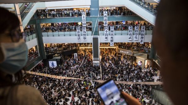 Pro-democracy protesters gather during a protest inside the New Town Plaza shopping mall in Hong Kong's Sha Tin district on September 22, 2019. (AFP/ File Photo)