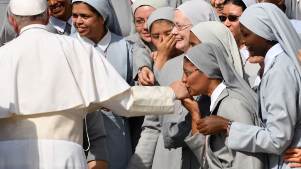 Pope Francis his greeted by nuns during his weekly general audience in the Vatican's Saint Peter square on September 25, 2019. Alberto PIZZOLI / AFP